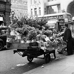 Street Traders: Flower stall at Oxford Circus station, London. May 1959