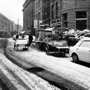 Street traders trying to do buisiness on the wintry streets of Newcastle on 7th December