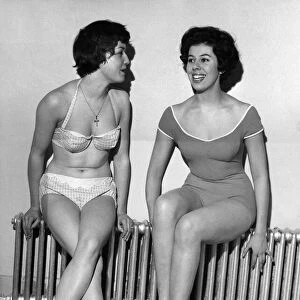 Strip Freeze. Models Verna Clarke and Thelma Drabble were happy to find this warm spot