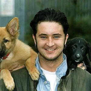 Stuart Wolfenden Actor with the two dogs he rescued from oldham RSPCA Named Tango
