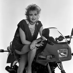 Su Pollard, pictured with a motorbike. January 1984 Su Pollard, pictured with a motorbike. January 1984
