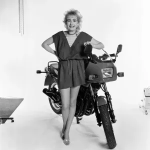 Su Pollard, pictured with a motorbike. January 1984 Su Pollard, pictured with a motorbike. January 1984