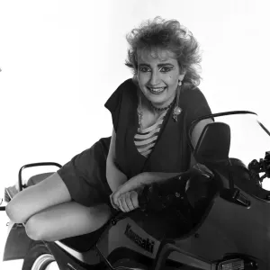 Su Pollard, pictured with a motorbike. January 1984 Su Pollard, pictured with a motorbike. January 1984