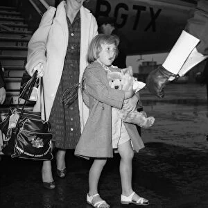 Suez Crisis 1956 British civillians return to a wet United Kingdom after leaving