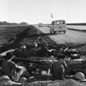 Suez Crisis 1956 Print: British Troops Watch UNO Vehicles