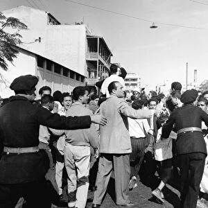 Suez Crisis 1956 Police keep crowds of gyptians back as United Nations troops march