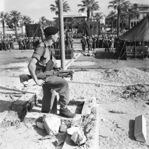 Suez Crisis 1956 Sapper R Griffenof Cardiff stands guard with his Bren gun as