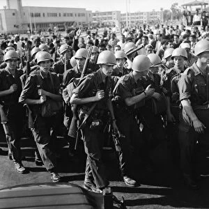 Suez Crisis 1956 United Nations troops march into Port Said past a restless
