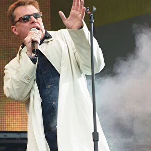 Suggs, lead singer of British ska group Madness, performing at Party in the Park at Hyde