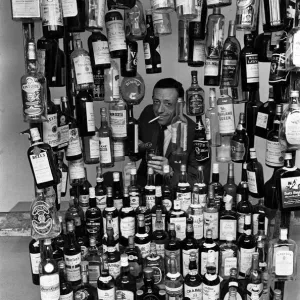 Sunday Mirror writer Stanley Shivas with the 137 best selling Scottish whiskeys