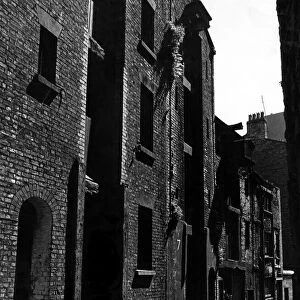 Sunlight and shade amid the warehouses. Litherland Alley, off Canning Place, Liverpool