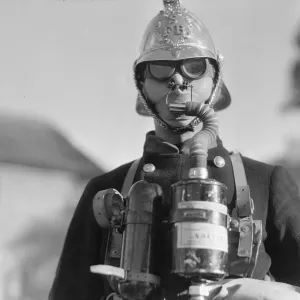 Surbiton Fire Brigade Display. October 1933 A fireman wearing smoke apparatus