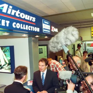 Surrounded by television crews and journalists Tony Blair tours the newly opened terminal Surrounded by television crews and journalists Tony Blair tours the newly opened terminal