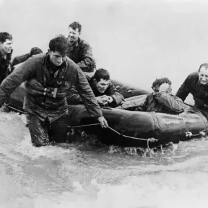Survivors of a landing craft off the coast of France came safely ashore in a rubber life Survivors of a landing craft off the coast of France came safely ashore in a rubber life