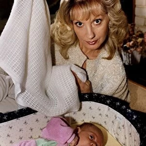 Susie Silvey Actress Model with baby A©Mirrorpix