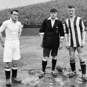 Swansea v Stoke FA Cup Tie. Joe Sykes of Swansea with referee P Harper Swansea v Stoke FA Cup Tie. Joe Sykes of Swansea with referee P Harper