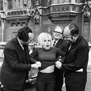 It was sweaters off for Barbara Windsor and members of Parliament outside the House of