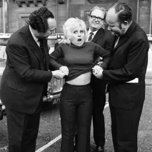 It was sweaters off for Barbara Windsor and members of Parliament outside the House of It was sweaters off for Barbara Windsor and members of Parliament outside the House of