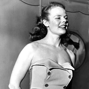 Swimsuit design by Marshal and Snelgrove 1951 with button detail