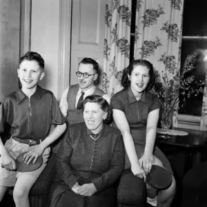 Table Tennis Family pose with bats February 1953 D707