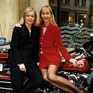 Tania Bryer TV Presenter of ITV with co-presenter Mariella Frostrup sits on Harley