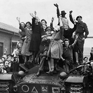 Tank Crew receive a cheery greeting when they visited a Government factory in the North