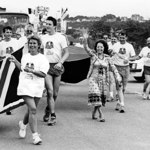 Black and white photograph print of runners in Clevedon Black and white photograph print of runners in Clevedon