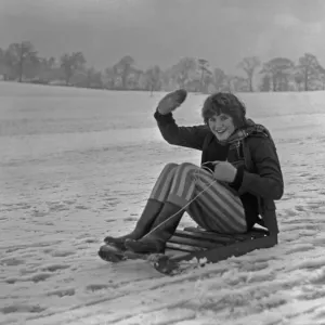 Teenager enjoying the snow in a Bristol park 31st December 1961 Teenager enjoying the snow in a Bristol park 31st December 1961