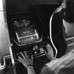 A teenager plays Space Invaders at an amusements arcade in Cardiff June 1981 A teenager plays Space Invaders at an amusements arcade in Cardiff June 1981