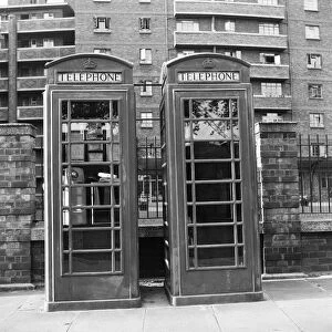 Telephone Kiosks outside a tall apartment block, 9th October 1962