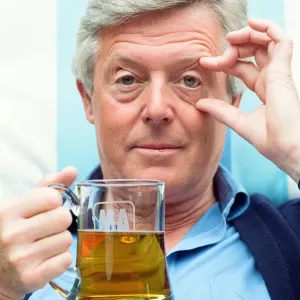 Television personality Michael Aspel. 29th May 1990