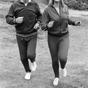 Television personality Nicholas Parsons jogging with his daughter. September 1976 Television personality Nicholas Parsons jogging with his daughter. September 1976