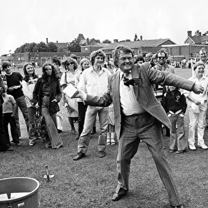 Television personality Tom Coyne in action during a fete at Warwick School