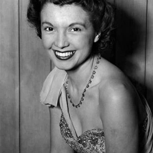 Television presenter and announcer Sylvia Peters. December 1955