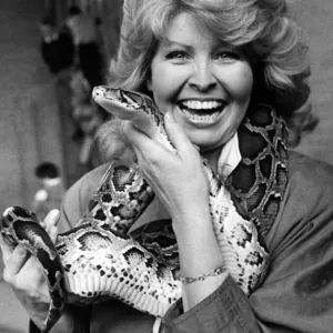 Cathy Secker with Sid the snake at St Bedes School Fete Print, 15th May 1988 Cathy Secker with Sid the snake at St Bedes School Fete Print, 15th May 1988