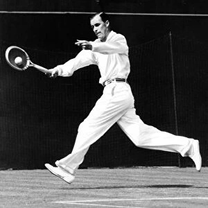 Tennis player Tilden who won his first match at Wimbledon against M. V. Summerson