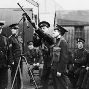Territorial recruits receiving instructions on the new Bren-Gun at the Drill Hall Merthyr Territorial recruits receiving instructions on the new Bren-Gun at the Drill Hall Merthyr