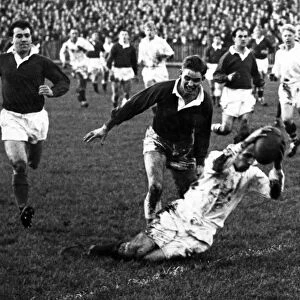 Terry Davies in action for Llanelli RFC. 3rd January 1959