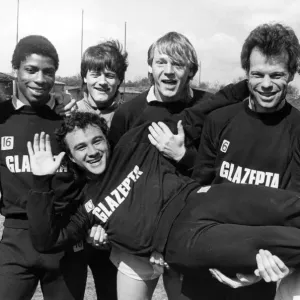 Terry Gibson is given a pick-me-up from his Sky Blues colleagues, including Stuart Pearce