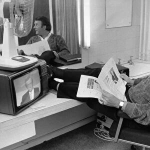 Terry Wogan takes a moment to relax before presenting his hit chat show Wogan March 1988