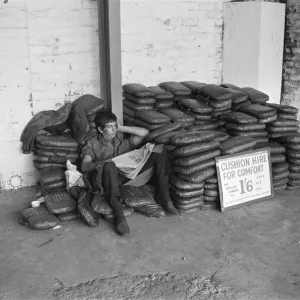 Test Match at Old Trafford. Cushion seller asleep. 13th June 1969 Test Match at Old Trafford. Cushion seller asleep. 13th June 1969