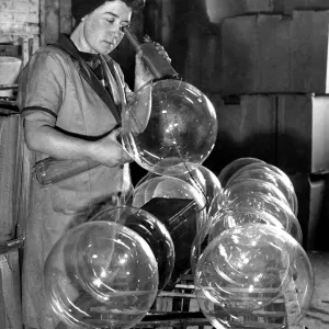 Testing beacon light bulbs at Lemington Glass Works Ltd, 25th January 1945 Print