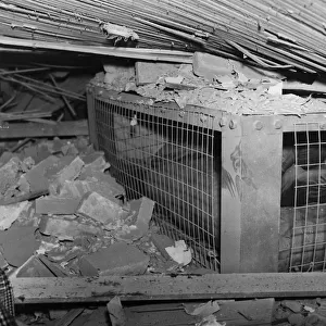 Tests of the new table-type indoor air raid shelter. A two-storey house was brought down