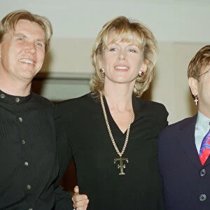Theo and Louise Fennell with Elton John at the opening of "Theo Fennell s"