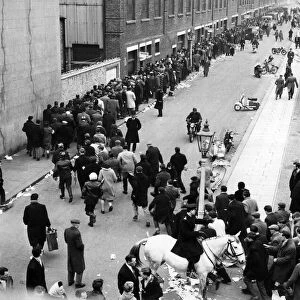 Thousands queue all night at Tottenham Hotspur football ground for tickets for the second