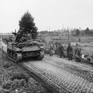 Thrusting north and east from Eindhoven, Netherlands, british troops crossed the Bois Le