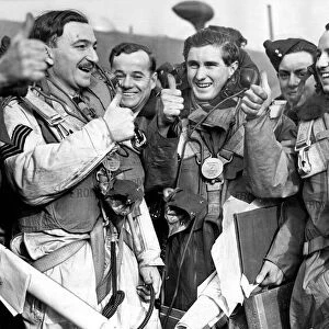 Thumbs up from crew members of the Wellington plane at an RAF air base January 1940