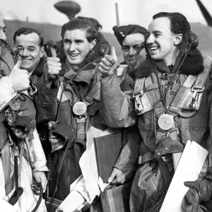 Thumbs up from crew members of the Wellington plane at an RAF air base January 1940