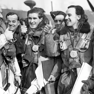 Thumbs up from crew members of the Wellington plane at an RAF air base January 1940