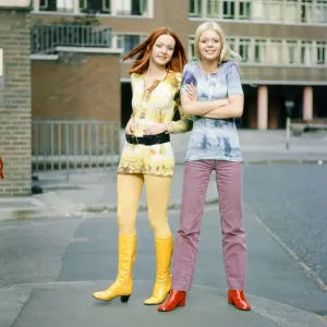 Tie-dye shirts worn by models, Jane (red hair) and Linda (blond hair). 3rd March 1970 Tie-dye shirts worn by models, Jane (red hair) and Linda (blond hair). 3rd March 1970